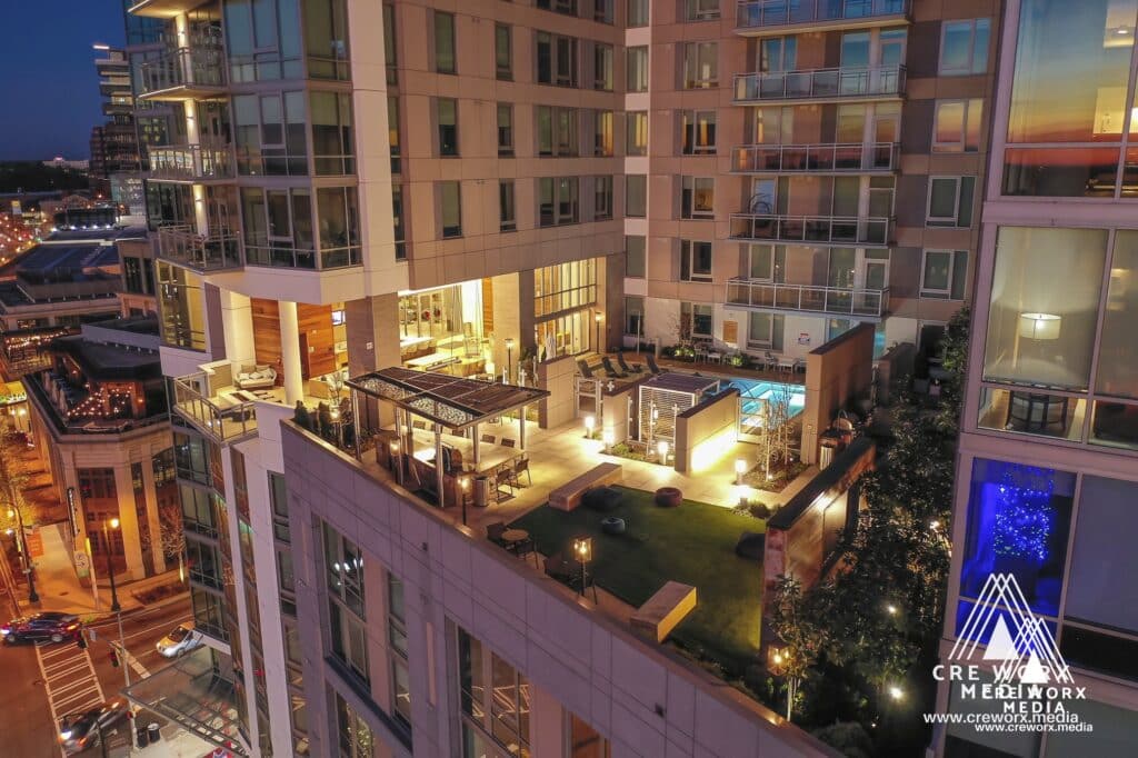 Pool deck at Modera Buckhead from above at dusk
